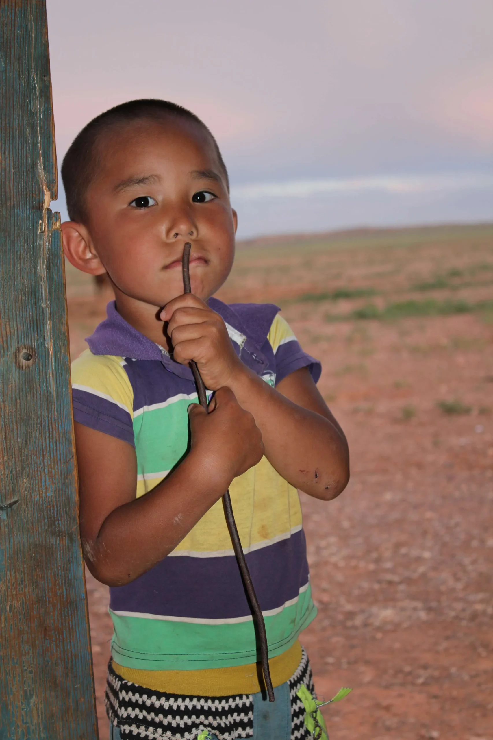 Mongolian kid wanted to play and waiting...