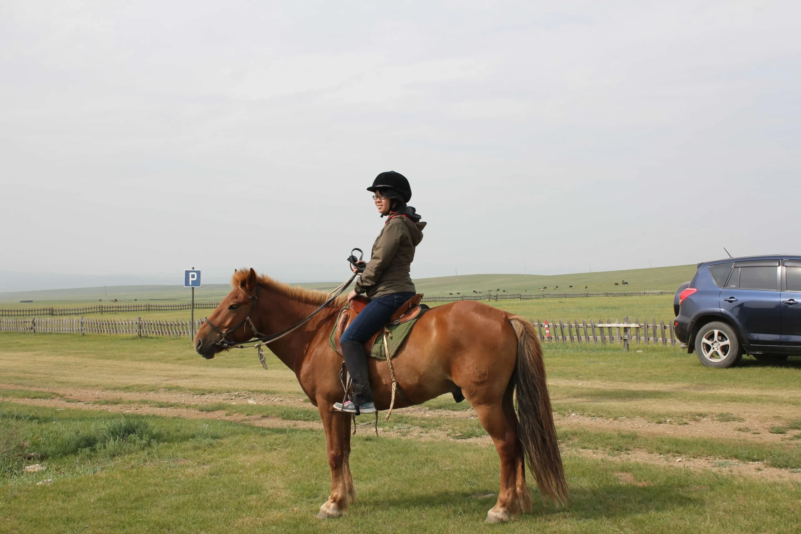 Hongkong girl, first time on horseback